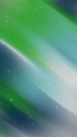 Abstract background animation with green and blue gradient and falling snowflakes for winter themes and celebrations video