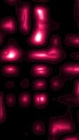 Dynamic magenta blobs morph and pulsate on a black background creating an abstract and visually engaging animation. video