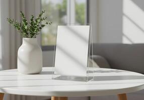 Mockup on Acrylic Stand Displaying a Blank Sheet on a Table 1 photo