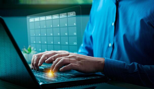 Business professional using digital tools to manage a futuristic calendar on interface, highlighting technology, and efficient time management solutions, appointment reminders, task plannin photo