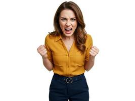 Woman in mustard blouse screaming with angry expression and clenched fists, isolated on white background photo