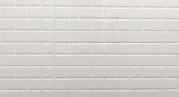 White Subway Tile Wall Background with Clean Geometric Pattern for Modern Interior Design and Architectural Projects photo
