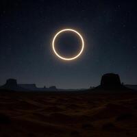The eclipse is seen over the desert in this photo