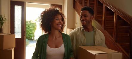 The happy couple moving into their new home with boxes in hand. photo