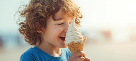 The joyful child savoring a delicious ice cream cone at the beach. photo