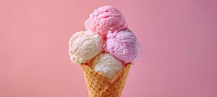 The colorful ice cream cone topped with three delicious scoops. photo