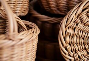 several wicker baskets stacked together in a pile photo