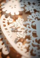 A close up of a snowflake on a table photo