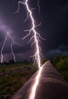 lightning bolt hitting a pipe in the middle of a field photo