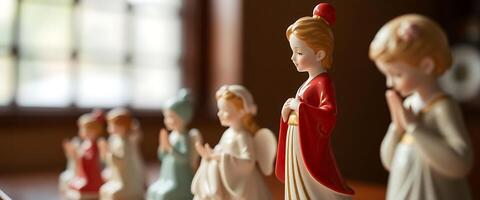 group of little figurines sitting on top of a table photo