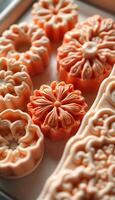 close up of a tray of cookies with icing photo