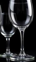 three empty wine glasses sitting next to each other photo