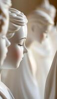 close up of a group of white statues photo