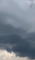 plane flying through a cloudy sky with a plane in the foreground photo