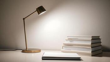 stack of books sitting on top of a table next to a lamp photo