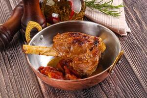 A pan with a meat dish in it photo