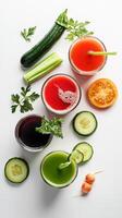 Various juices and vegetables in bowls on a white surface photo