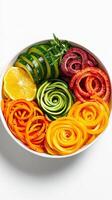 A bowl of vegetables with a spiral shape photo