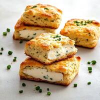 Four pieces of cheese and green onions photo