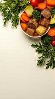 A plate of meat, vegetables and herbs on a white background photo