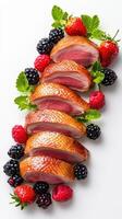 Duck breast with berries and mint photo