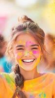 A girl dances joyfully at Holi, her face vibrant with colors and powders filling the air photo