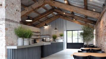 A stylish cafe blends industrial textures with modern furnishings and reclaimed materials photo