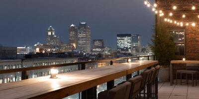 Cozy rooftop bar on a post-industrial building offers stunning city views at night with twinkling lights photo