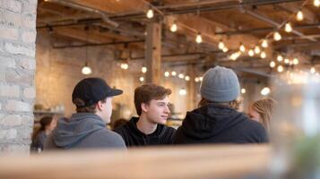 Friends gather in a cozy coffee shop with exposed brick and soft lighting, sharing laughs and stories photo