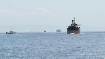 turkey istanbul 19 may 2025, Ships navigating through calm waters near the coastline video
