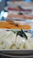 Tasty cheese and fresh ingredients at brunch buffet table video