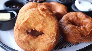 Delicious fresh pastries served with sweet toppings video
