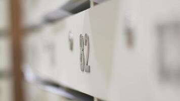 Close-up view of numbered drawer fronts showcasing neat storage solution video