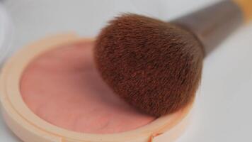 Applying blush with a brush for a natural look video