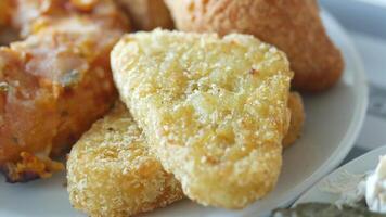 Tasty golden fried snacks served at local eatery video
