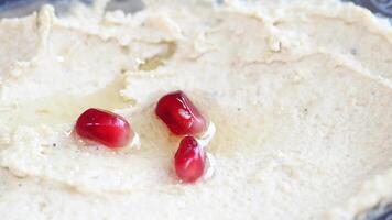 Healthy hummus recipe with fresh ingredients and pomegranate video
