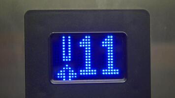 Elevator display shows floor ten and direction indicators video