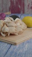 Slicing fresh mushroom with lemon and olive oil preparation video