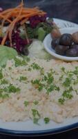 scrambled egg with olive on a plate video