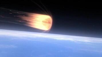 Spacecraft re-entering earth's atmosphere generating intense heat and glowing trail of light. video