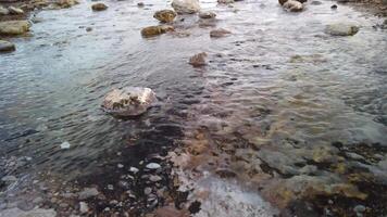 Close up of small hot stream from Geysir in Iceland video