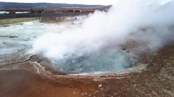 Hot spring pool Geysir in Iceland boiling and waiting to erupt video
