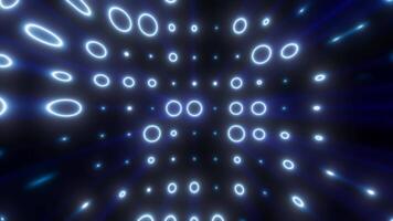 Glowing blue rings form a tunnel-like digital vortex with radiating light beams in a futuristic abstract pattern video