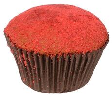 A single red velvet cupcake with red crumbs on top, baked in a dark brown paper liner, isolated background photo
