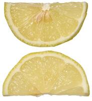 Two fresh lemon slices, cut into semicircles, isolated background photo