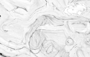 White marble texture with abstract swirling patterns photo