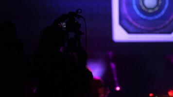 Camera operator working in a show concert video