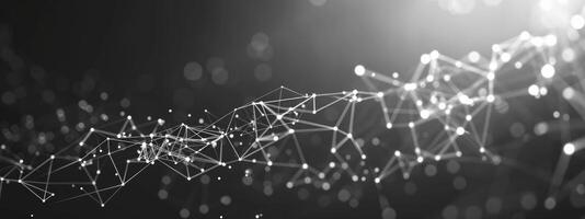 White glowing dots connected by lines on dark grey gradient, technology and connection concept photo