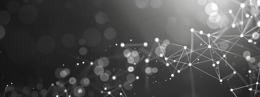 White glowing dots connected by lines on dark grey gradient, technology and connection concept photo
