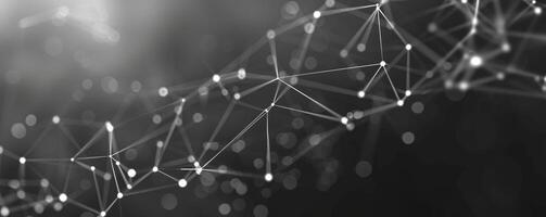 White glowing dots connected by lines on dark grey gradient, technology and connection concept photo